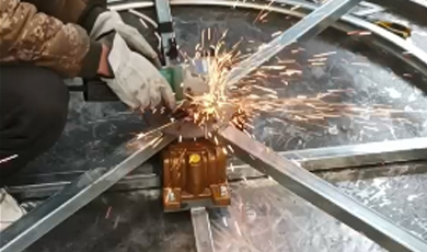 Grinding and polishing to remove burrs